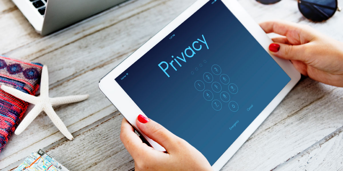 woman holding iPad with privacy screen