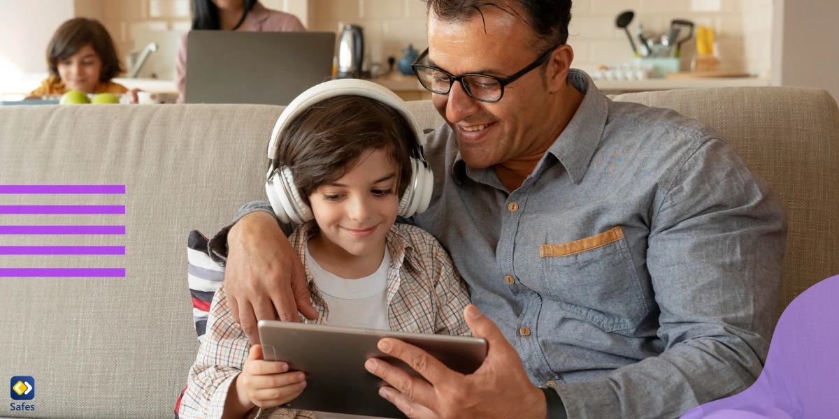 Father monitoring his son's social media use and teaching him how to use social media positively and safely